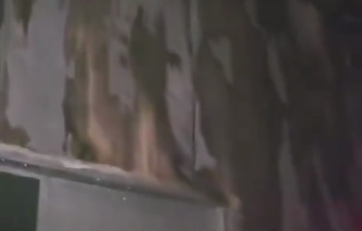 Thumbnail preview image for the video titled: Settlers set fire to a school and sprayed graffiti on it in the village of Jalud