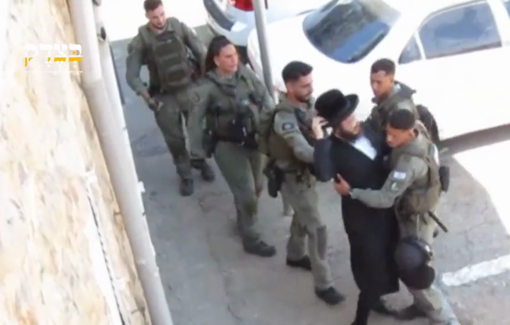 Thumbnail preview image for the video titled: Police officers beating demonstrators with batons at a protest against the conscription of Haredim in Jerusalem